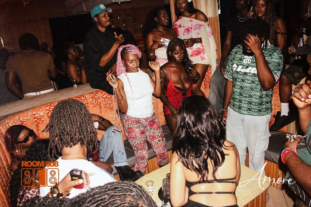 Room 808 at Amore Toronto — packed booth section serviced by Brat Haus Collective